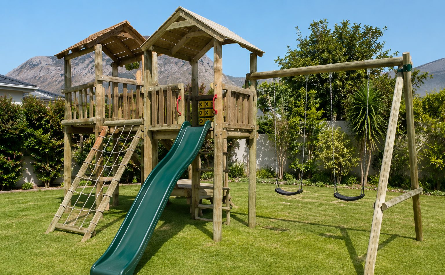 Wooden jungle gym with slide and swings